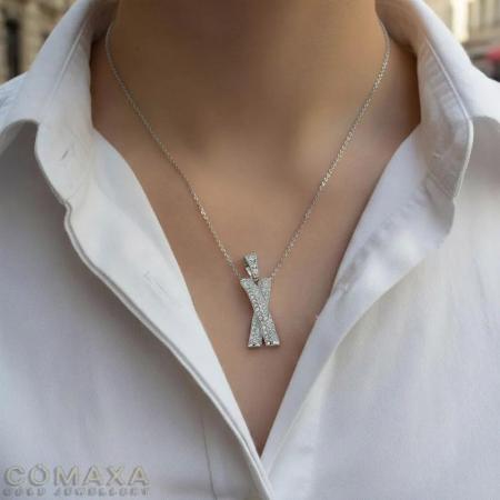 Медальон от бяло злато във формата на хикс